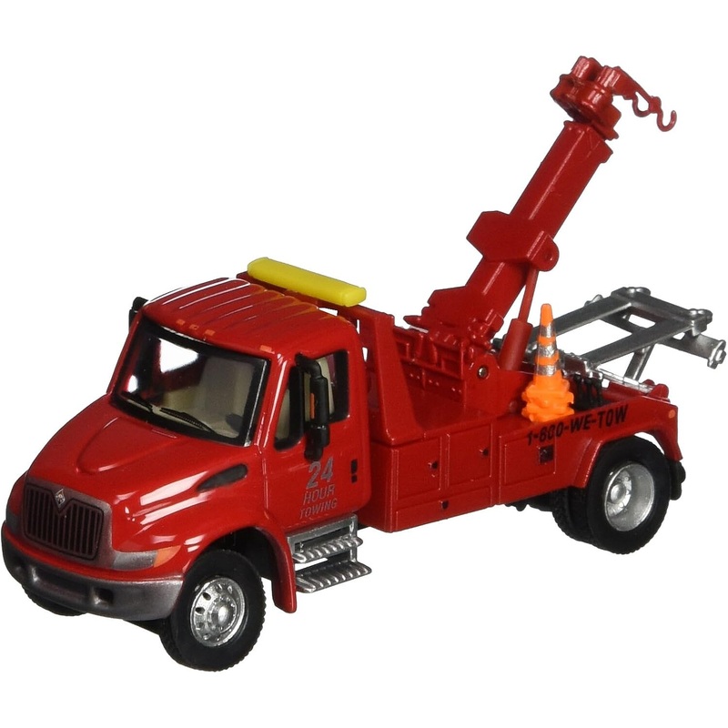 International 4300 Red Tow Truck